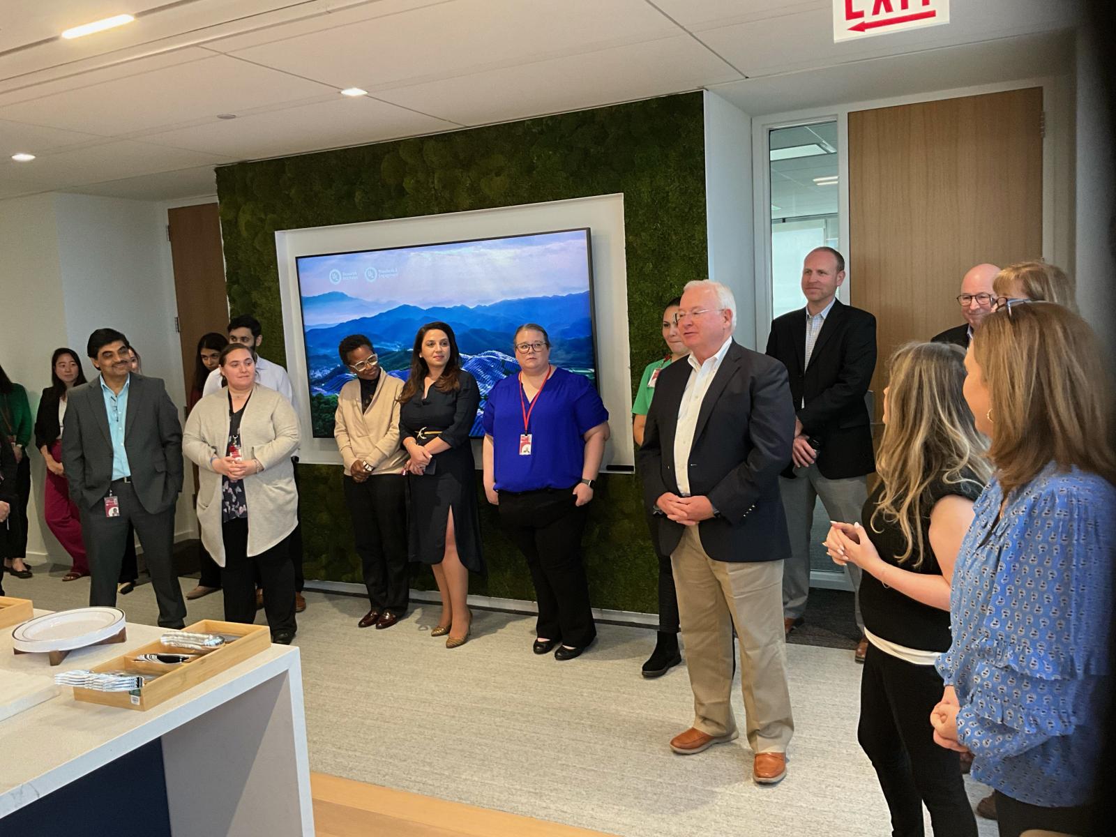 Terrence R. Brady, ULRI president and CEO and ULSE board chair, welcomes employees as part of a week-long celebration of the organizations’ move to Evanston. Kevin Mehaffey, director of facilities and expansion for ULRI/ULSE, looks on. 