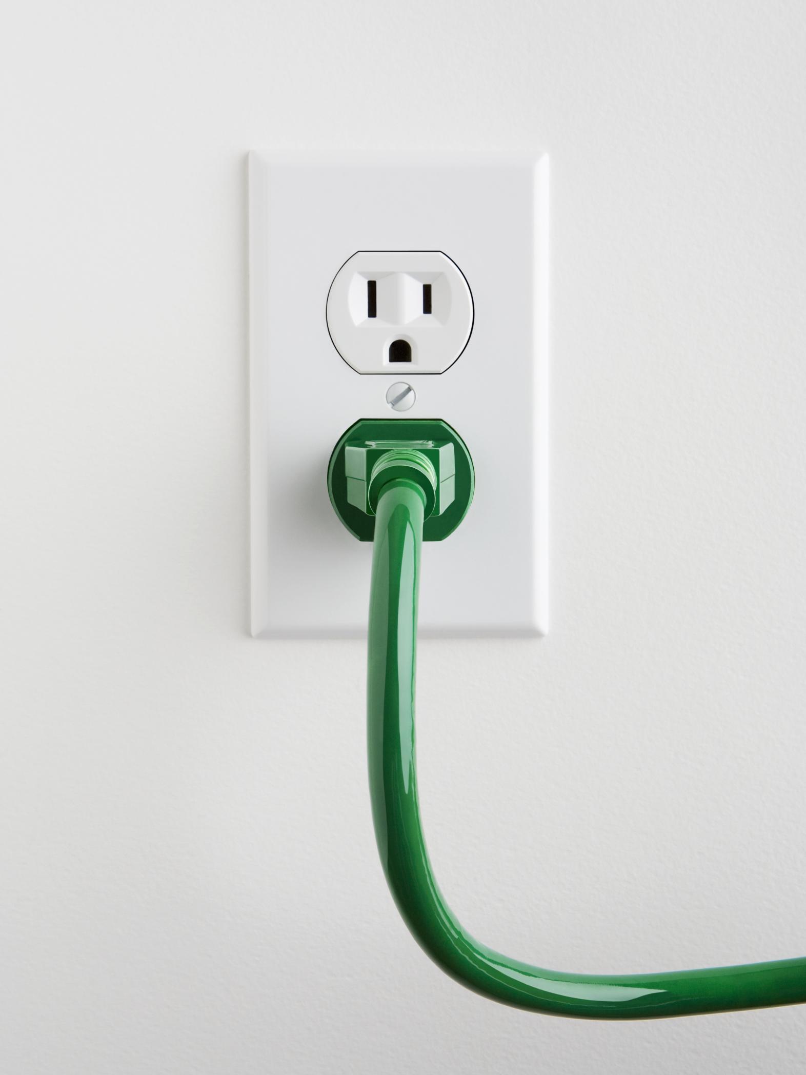 A plug inserted into a household outlet