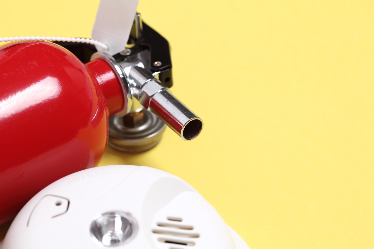 Fire safety equipment including a fire extinguisher and smoke detector, which are necessary for fire safety