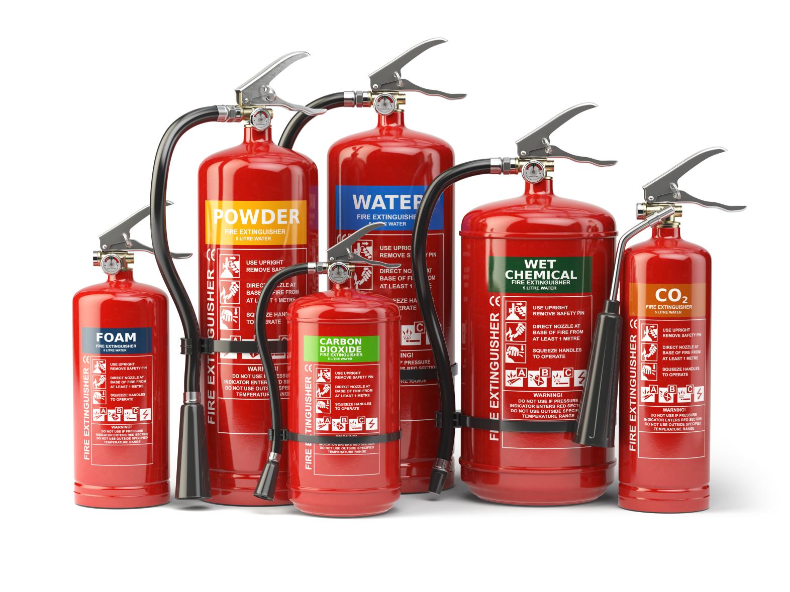 Various types of fire extinguishers isolated on white background. 