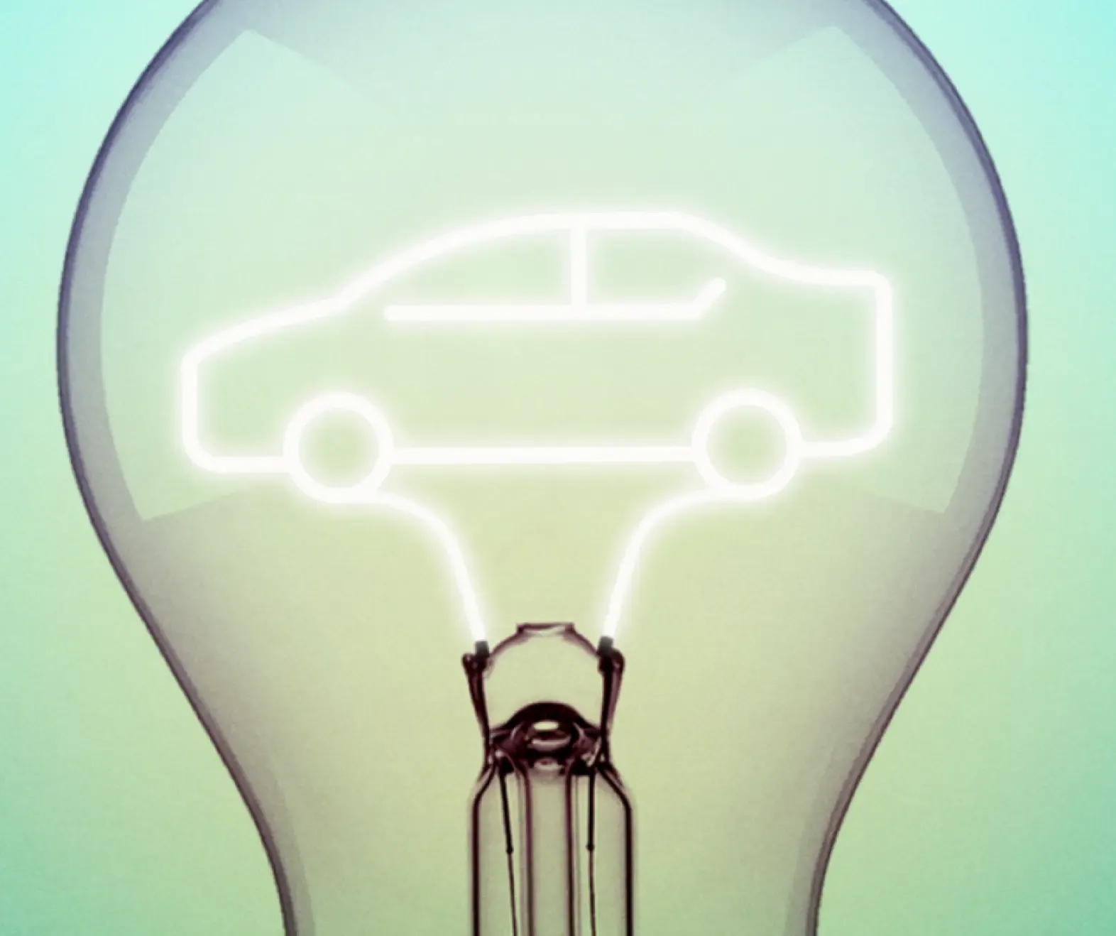 Image of a glowing vehicle outlined in a lightbulb filament 