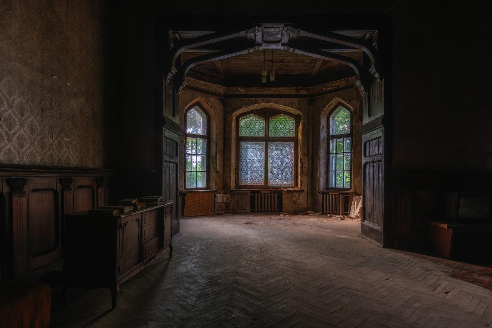 View into an abandoned house's dining room.