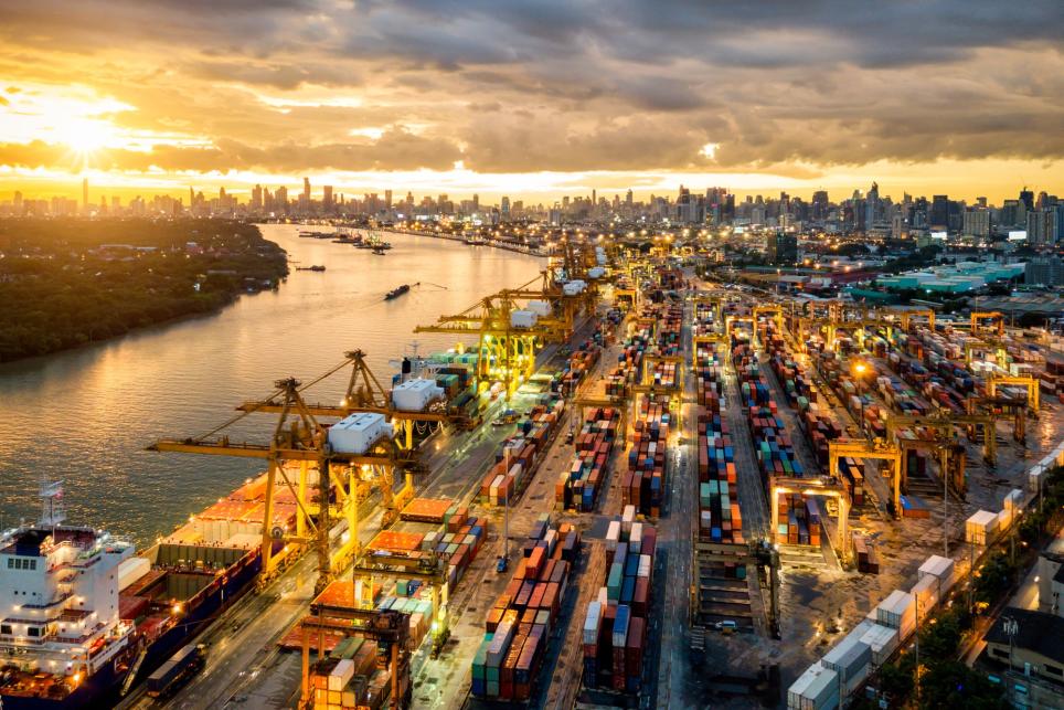 Shipping containers at a riverside port