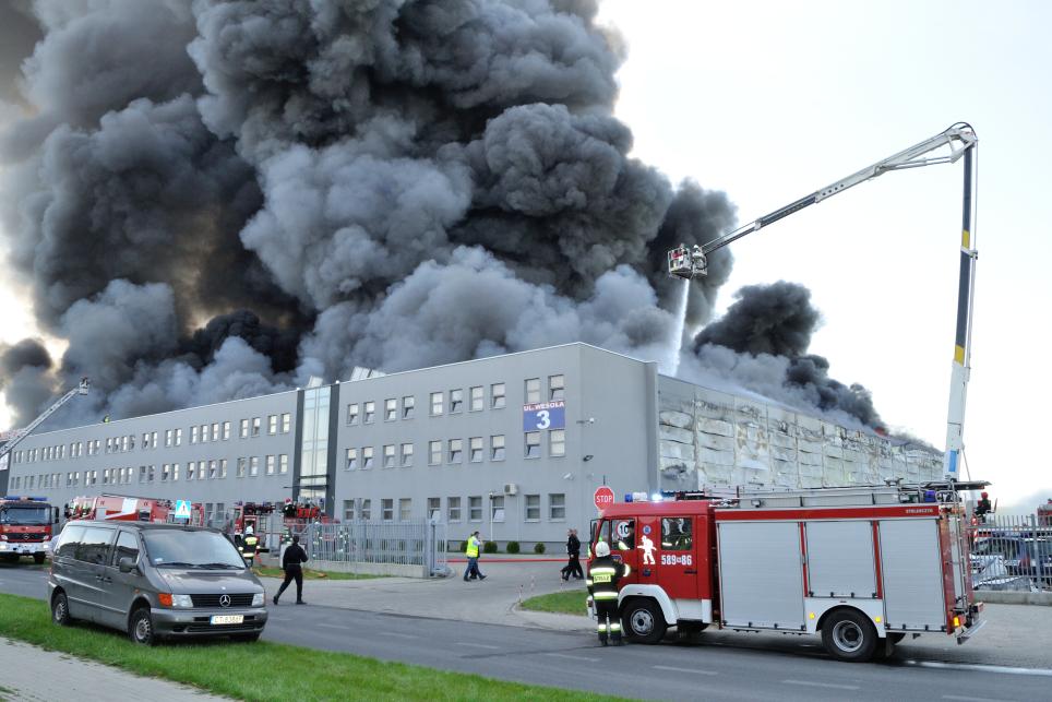 Firefighting crews battle a storehouse fire in Europe