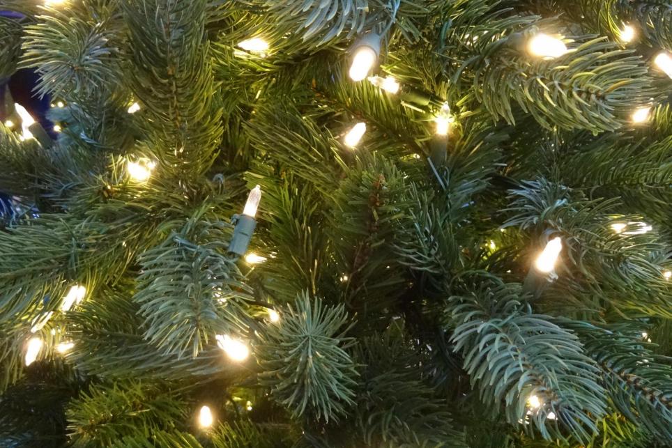 decorative LED holiday lights on an artificial, pre-lit Christmas tree