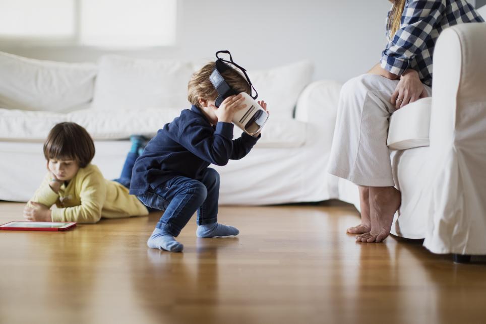 Boy playing with VR headset
