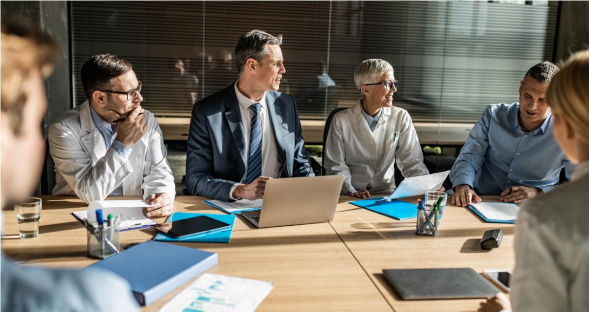 Staff at conference table