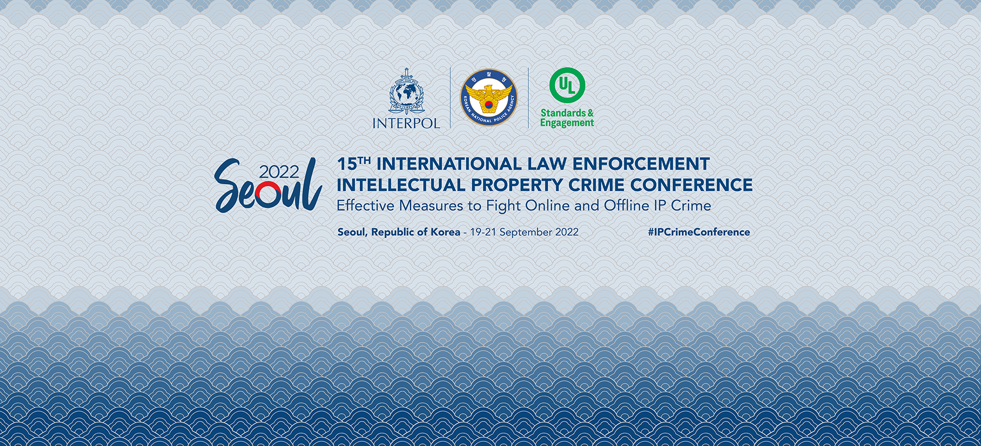 Banner for the 15th International Law Enforcement Intellectual Property Crime Conference in Seoul, South Korea, September 19-21, 2022, with INTERPOL and other logos on a blue patterned background.