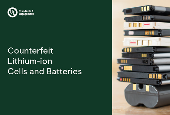 A stack of various lithium-ion batteries sits on a table next to text that reads, “Counterfeit Lithium-ion Cells and Batteries” with a UL Standards & Engagement logo above.