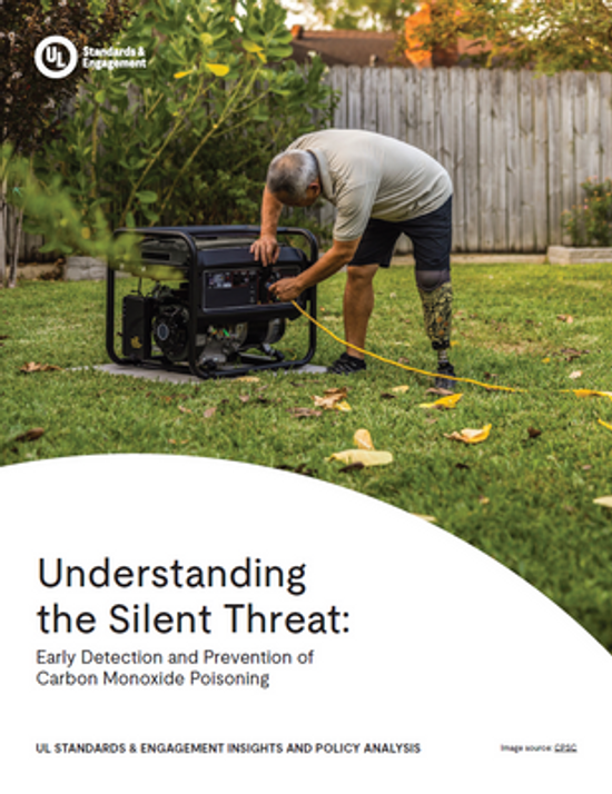 A man with a prosthetic leg sets up a portable generator outdoors in a backyard. The text discusses understanding, detecting, and preventing carbon monoxide poisoning.