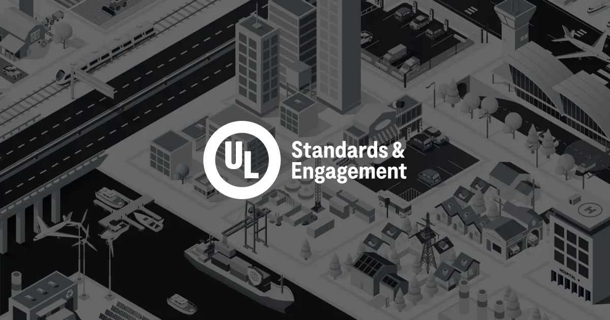 A grayscale cityscape with buildings, roads, a ship, wind turbines, solar panels, and vehicles. The "UL Standards & Engagement" logo is centered over the image.