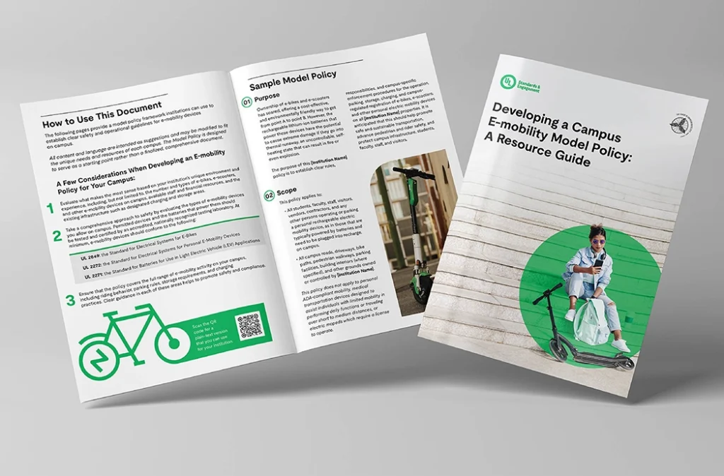A booklet titled "Developing a Campus E-mobility Model Policy: A Resource Guide" is shown open and closed. The cover features a person sitting on a curb with an e-scooter; inside are policy guidelines and green icons.