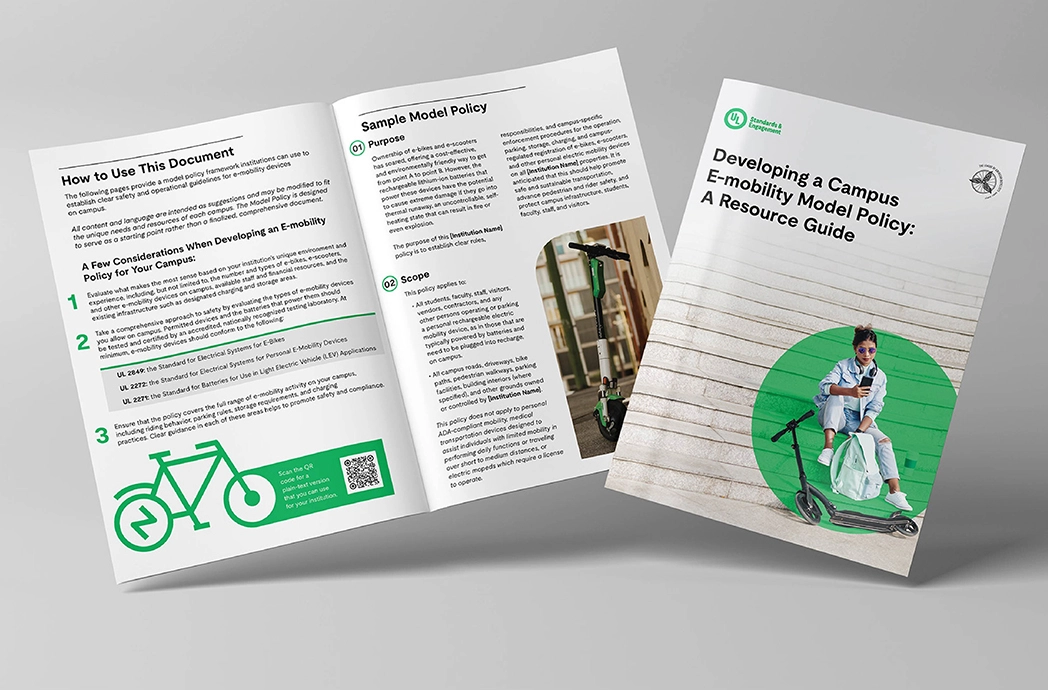 A booklet titled "Developing a Campus E-mobility Model Policy: A Resource Guide" is shown open and closed. The cover features a person sitting on a curb with an e-scooter; inside are policy guidelines and green icons.
