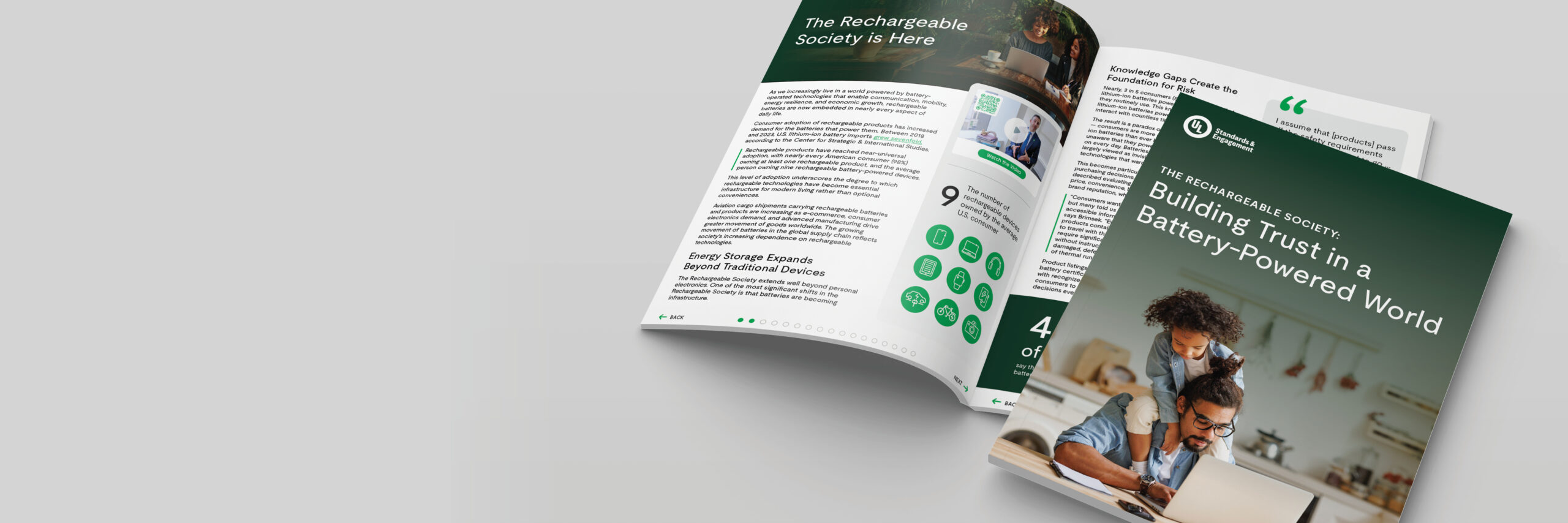 Two open magazines on a light surface. The visible cover headline reads, “Building Trust in a Battery-Powered World.” The inside pages show articles, text, images of people, and large numbers in bold.